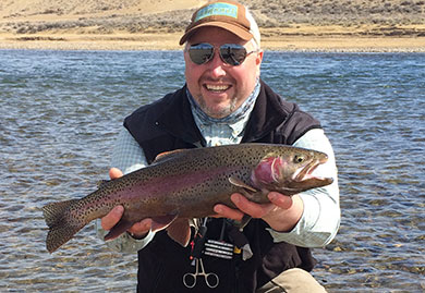 Jans fly fishing guide Travis Vernon shows off his latest catch.
