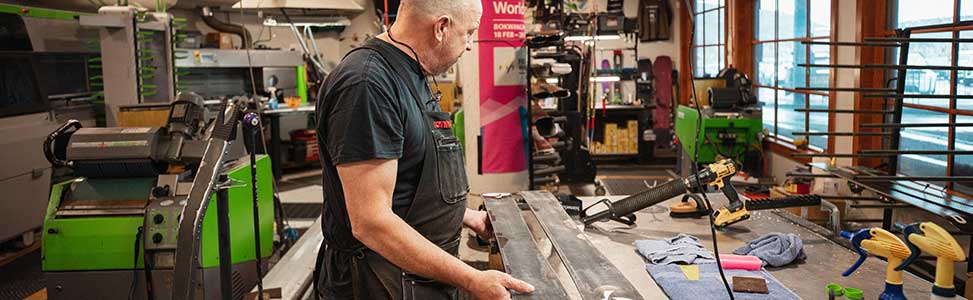 Jans Expert tech performing a ski tune and storage wax at Rennstall Tuning Center in Park City, Utah.