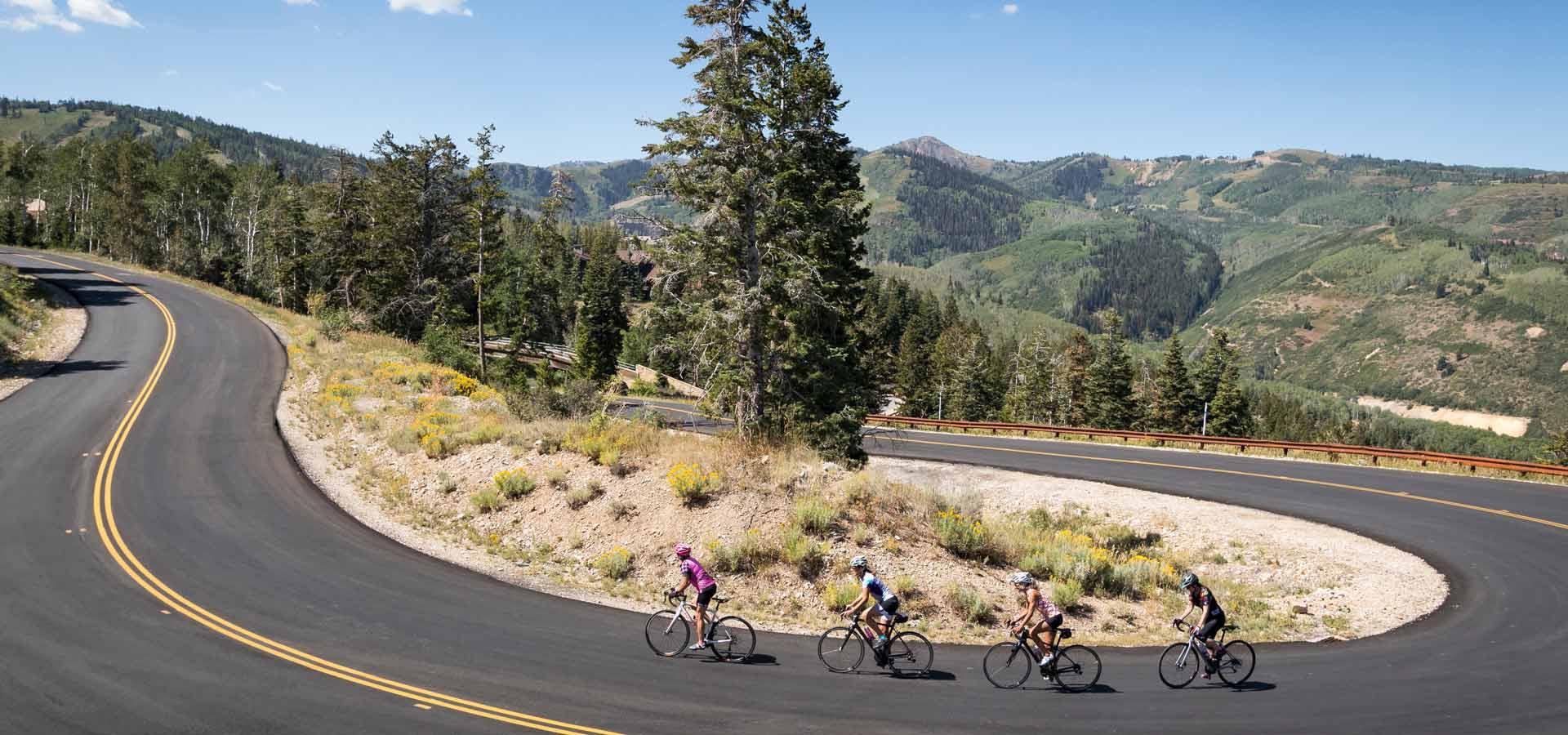 Cyclists enjoying a hill climb on a mountain road near Park City, UT