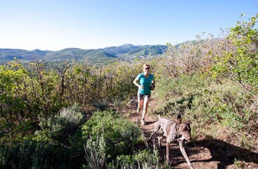 Carolyn Holliday trail running with jans.com in Park City, Utah