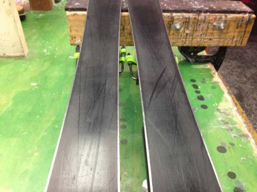 Dried out bases of a pair of skis.