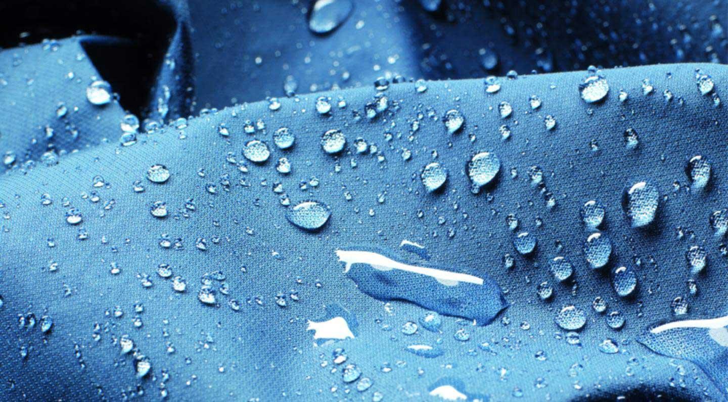 Water droplets on a piece of GORE-TEX waterproof fabric.
