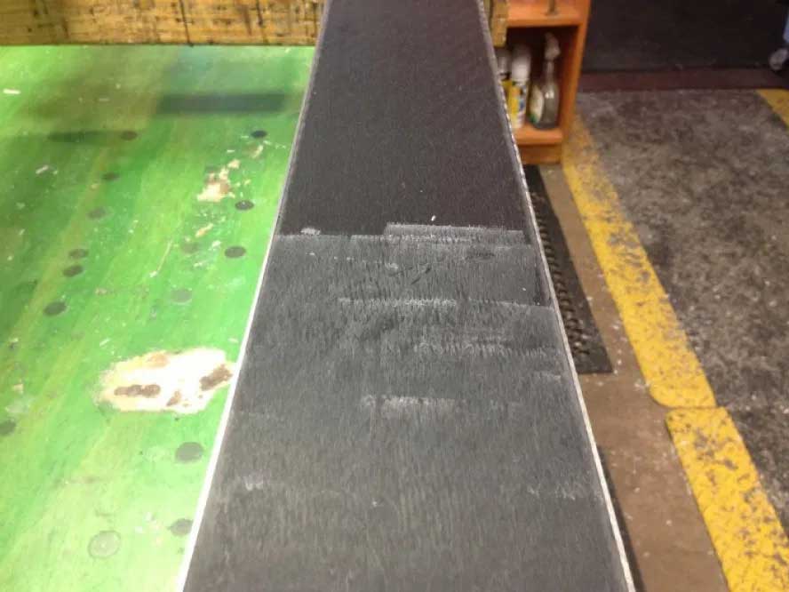 Even haze of wax on the base of a pair of skis.