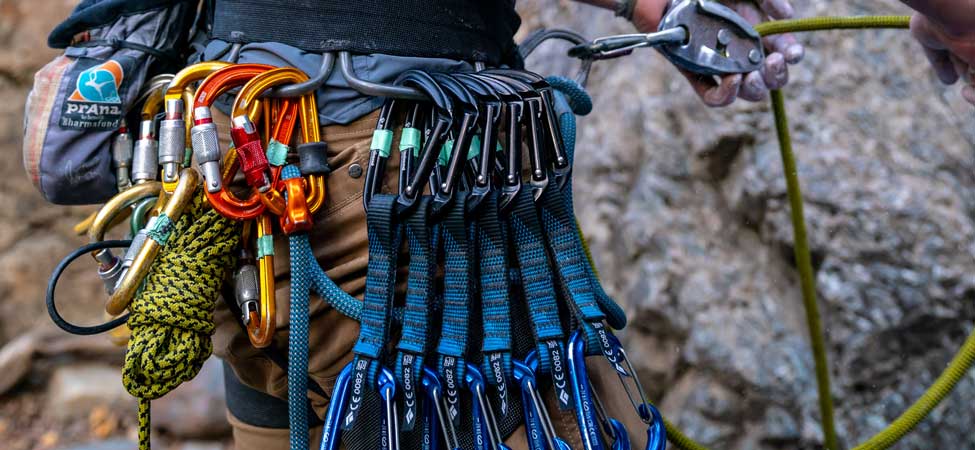 Jans expert belaying a climber in Big Cottonwood Canyon, Utah.