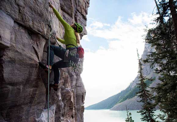 A Jans expert leads a steep climb above a lake.