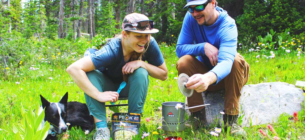 Jans experts preparing a backpacking dinner in the Uinta Mountains, Utah. 