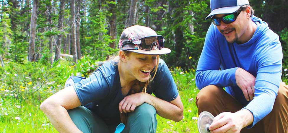 Jans experts boiling water for a backpacking meal in the Uinta Mountains, Utah.