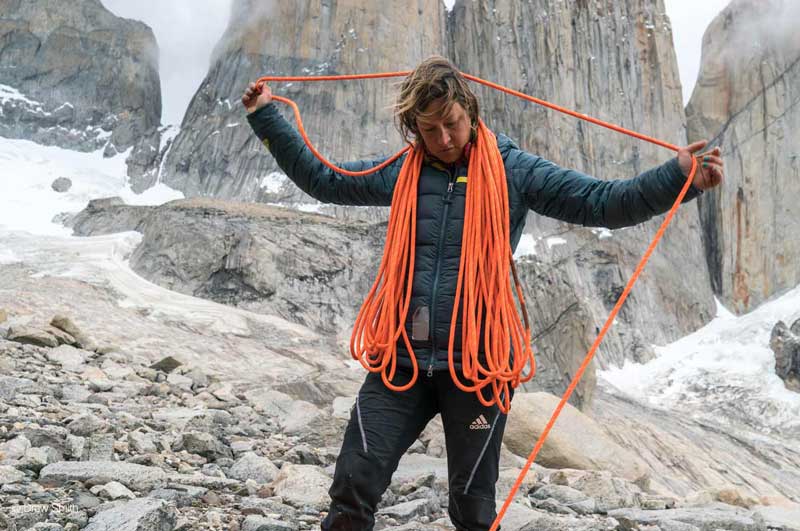 A climber demonstrates the butterfly coil technique. Image courtesy of Petzel.