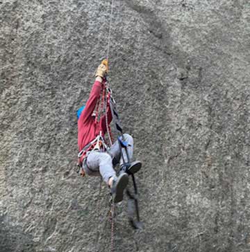 Jans expert jugging a fixed line with ascenders and aid ladder.