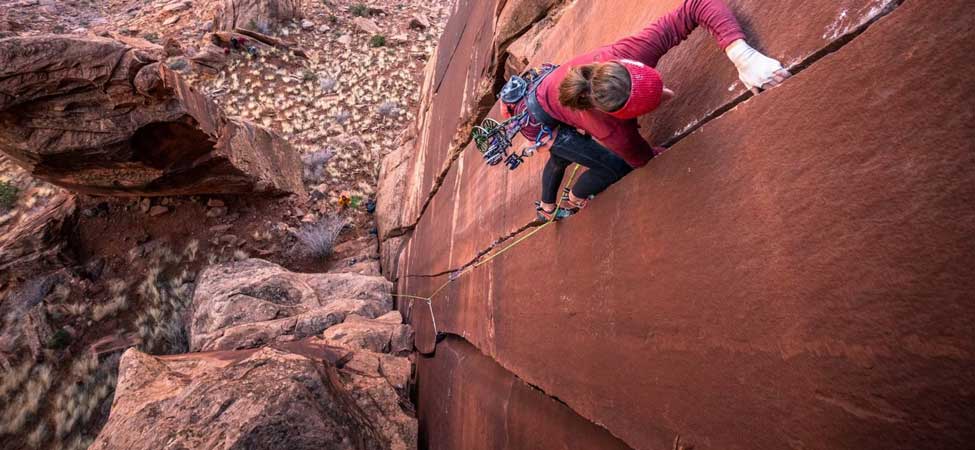 Trad climber ascends a crack. Image courtesy of Black Diamond.