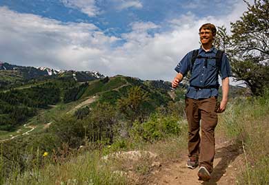 Jans hiking guide Stuart Johnson hikes in the mountains of Park City, Utah.
