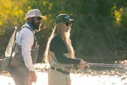 Jans fly fishing guide Billy Cosby teaches a client how to fly fish.