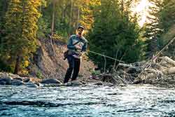 Jans fly fishing guide fishing a river in the Uinta mountains.